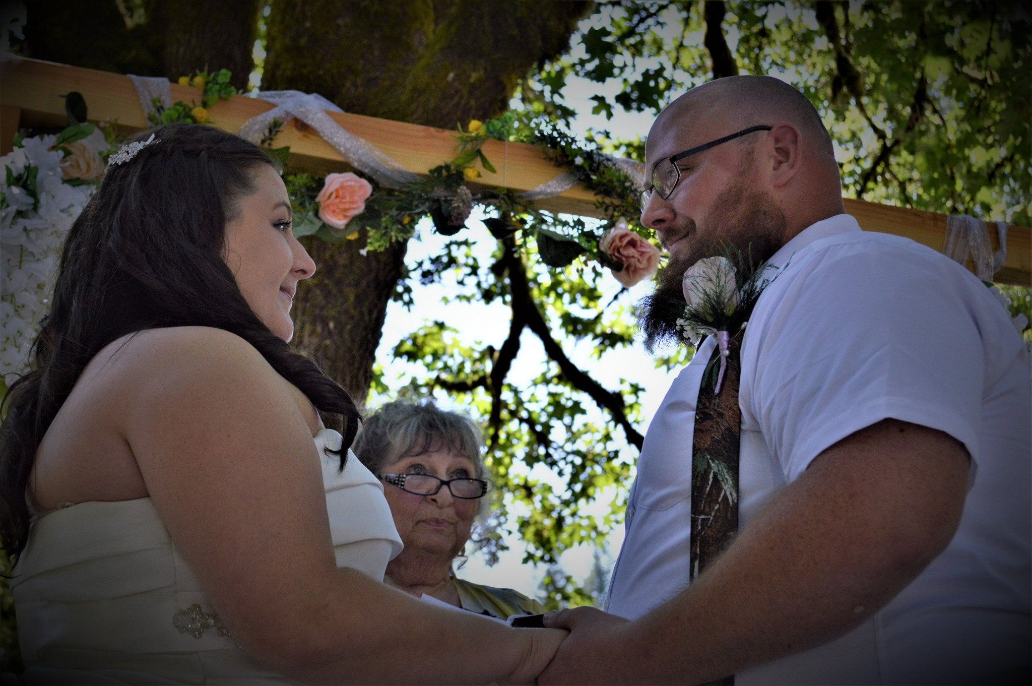 photo of bride and groom at the altar